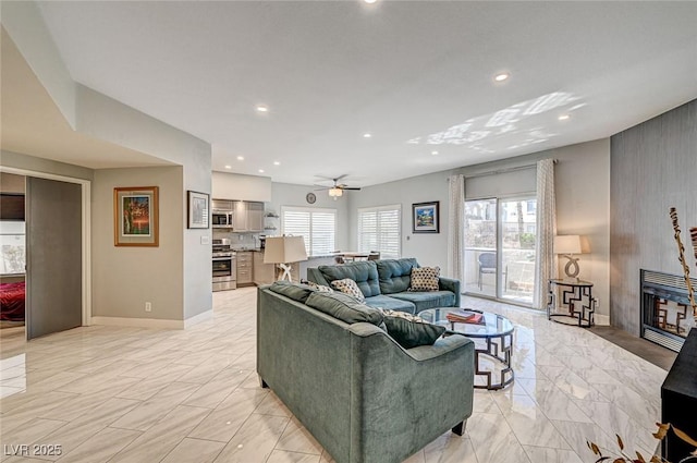 living room with ceiling fan