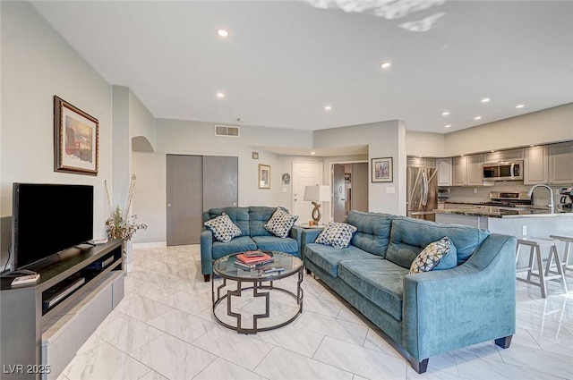 living room with sink