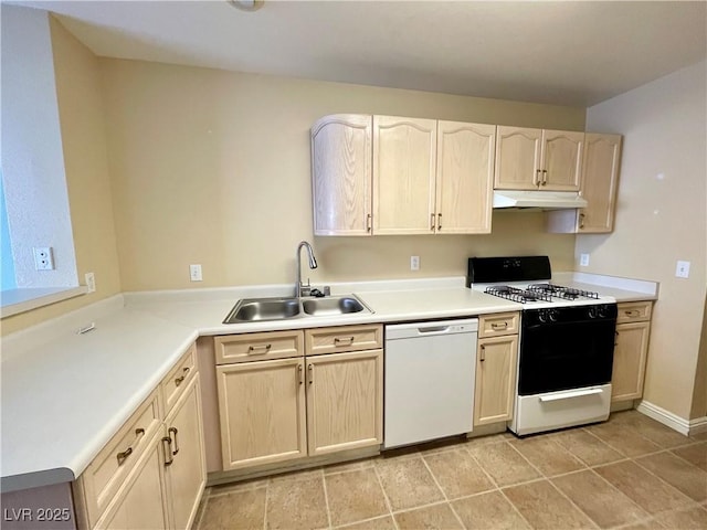 kitchen with sink, gas range, dishwasher, and light brown cabinets