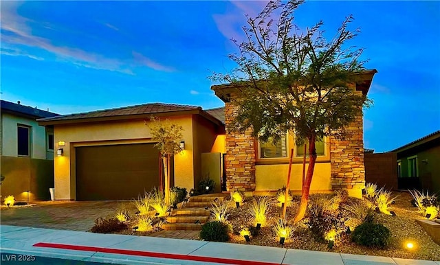 view of front of property featuring a garage