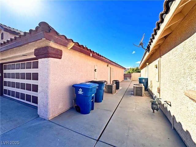 view of home's exterior featuring central AC unit