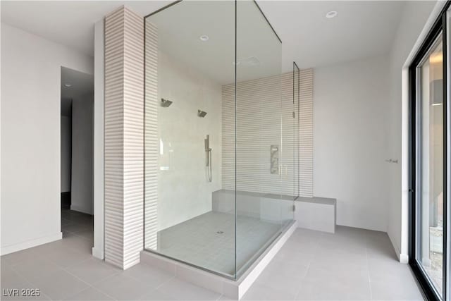 bathroom with tile patterned floors and walk in shower