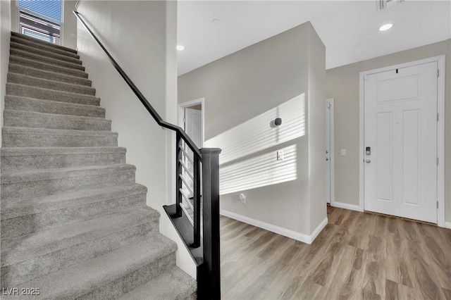 foyer entrance featuring light hardwood / wood-style flooring