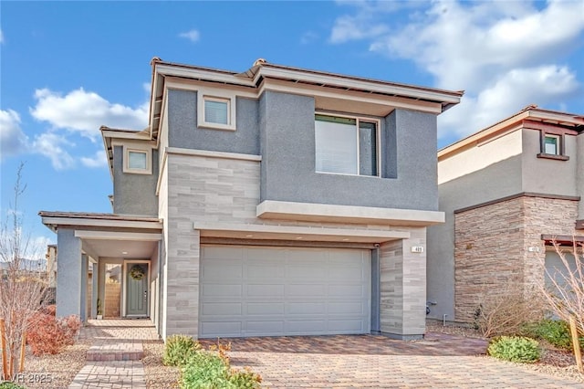 view of front of home with a garage