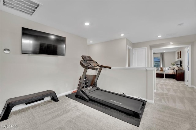 workout room with light carpet