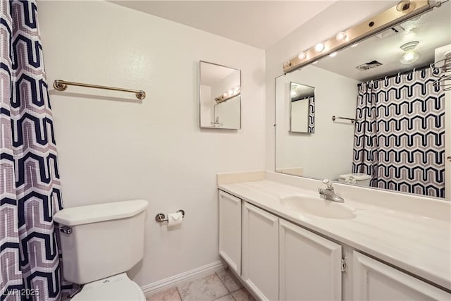 bathroom with vanity, curtained shower, and toilet