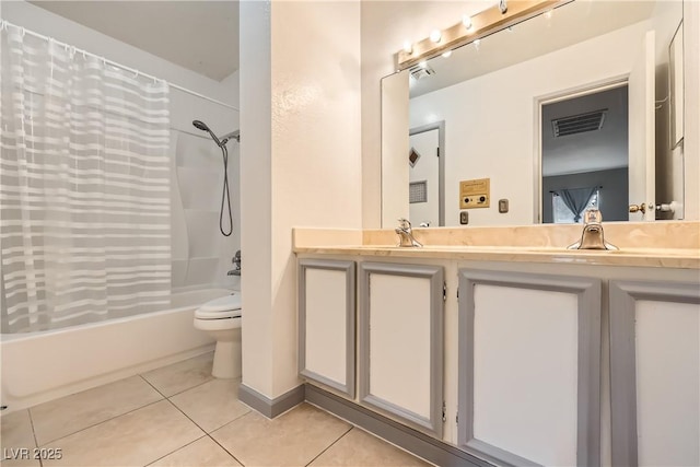 full bathroom featuring shower / tub combo, vanity, tile patterned floors, and toilet