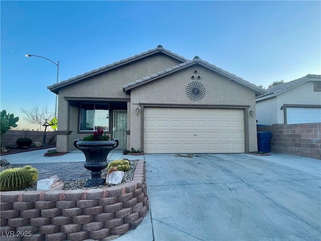 single story home with a garage