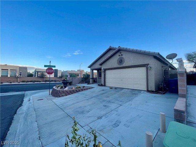 view of property exterior with a garage