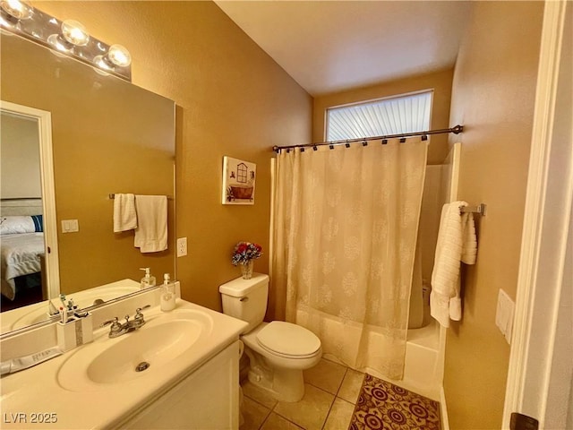 full bathroom featuring shower / bathtub combination with curtain, vanity, tile patterned floors, and toilet