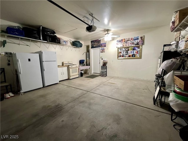 garage featuring a garage door opener, white fridge, and ceiling fan