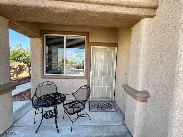 doorway to property featuring a patio