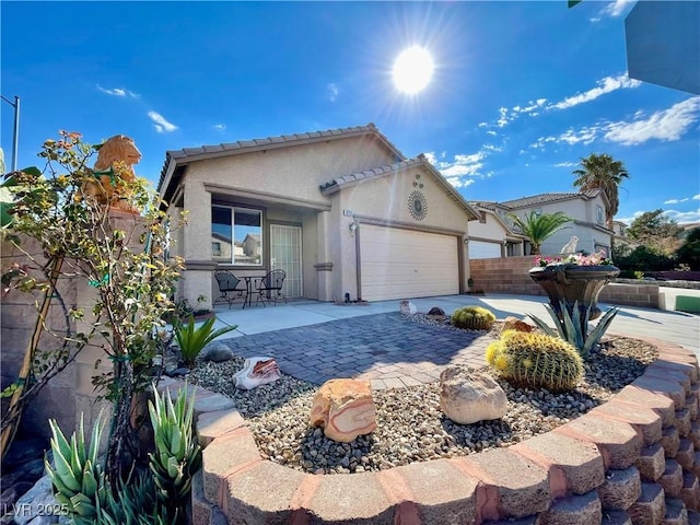 view of front of home with a garage