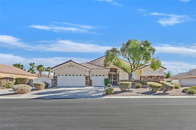 view of front of home with a garage