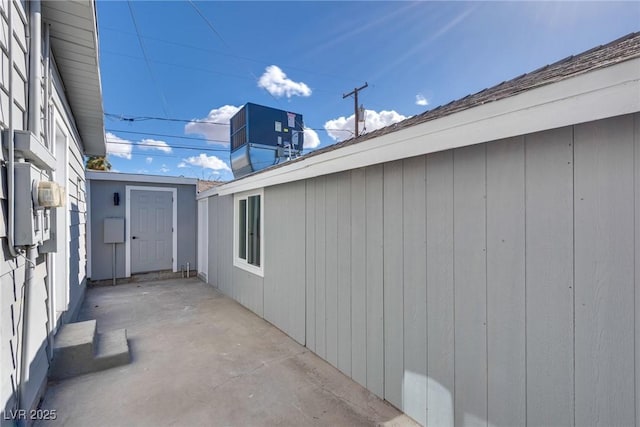 view of property exterior with a patio