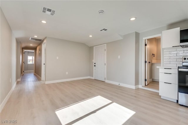 unfurnished living room featuring light wood-type flooring