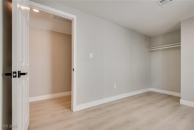 unfurnished bedroom with light hardwood / wood-style flooring