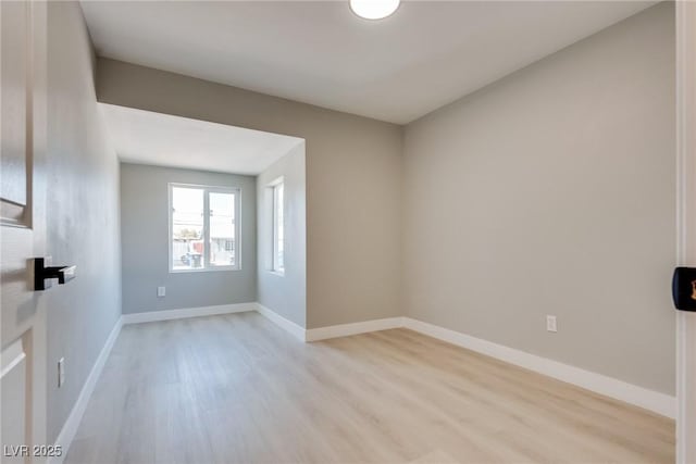 empty room featuring light hardwood / wood-style floors