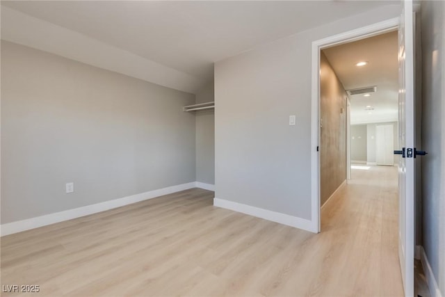 empty room featuring light hardwood / wood-style floors