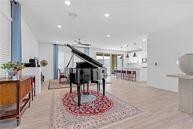 interior space featuring visible vents, baseboards, and recessed lighting