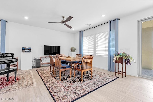 dining room featuring baseboards, a ceiling fan, visible vents, and recessed lighting