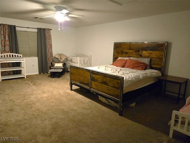 carpeted bedroom featuring ceiling fan