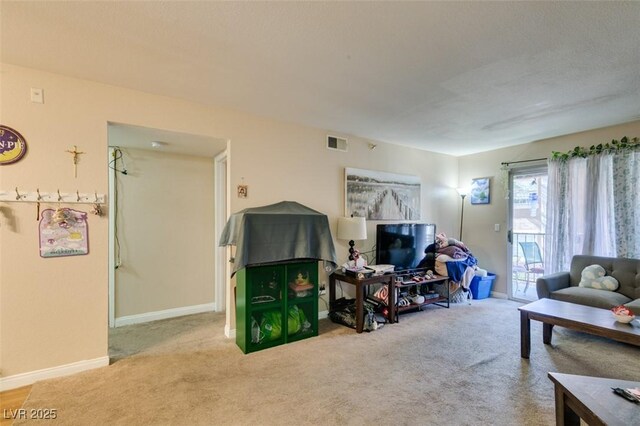 living room featuring light colored carpet