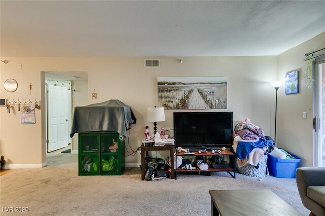 living room with light colored carpet