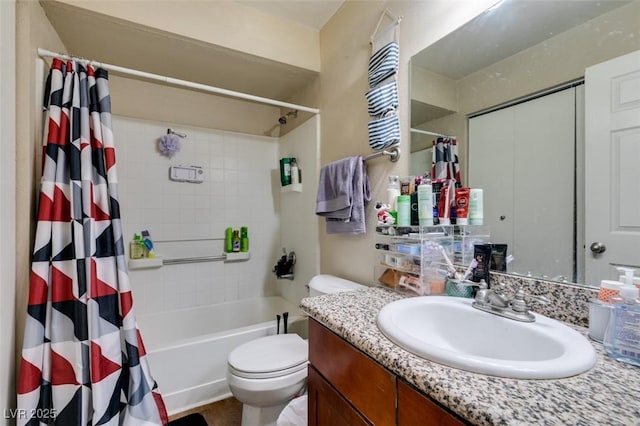 full bathroom with vanity, shower / bath combination with curtain, and toilet