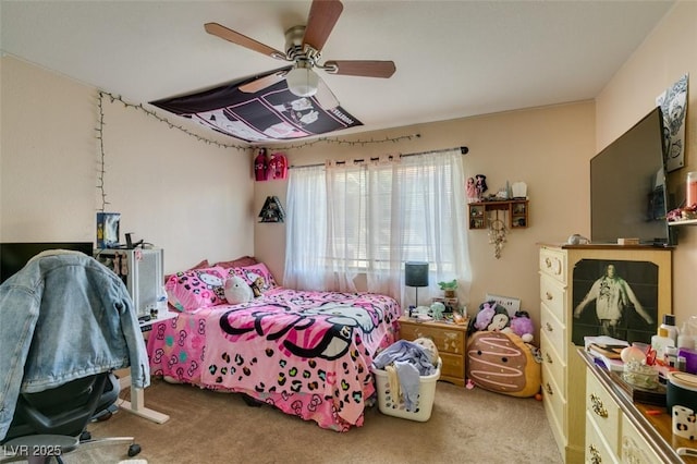 bedroom with ceiling fan and carpet floors