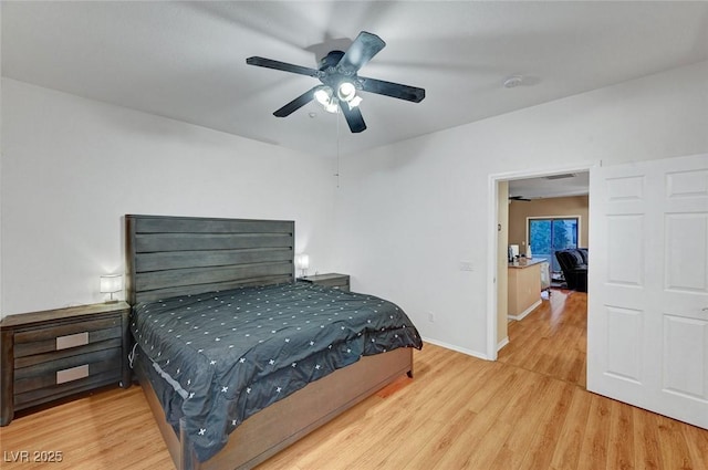 bedroom featuring hardwood / wood-style flooring and ceiling fan