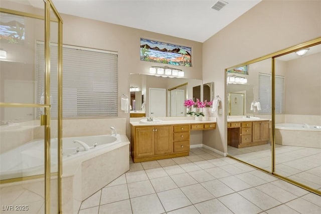 full bath featuring visible vents, two vanities, a stall shower, tile patterned floors, and a bath