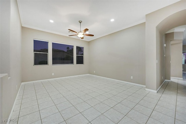 unfurnished room with crown molding and ceiling fan