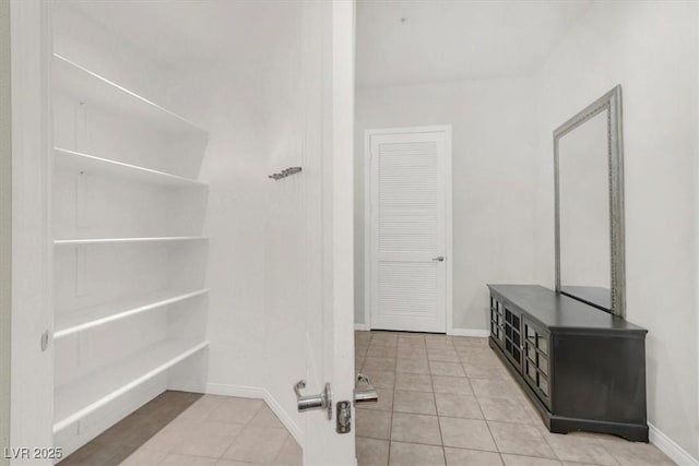 bathroom with tile patterned flooring