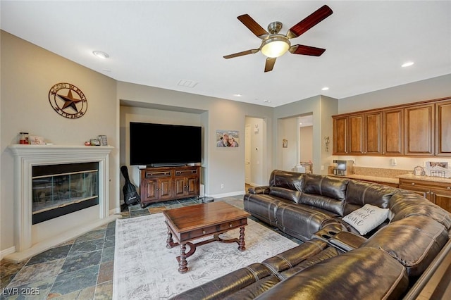 living room featuring ceiling fan