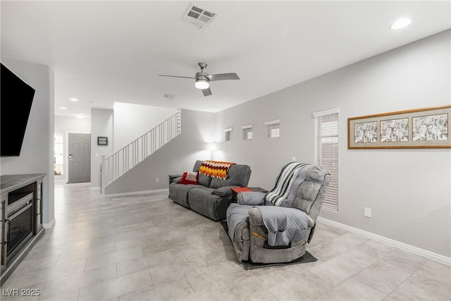 living room featuring ceiling fan