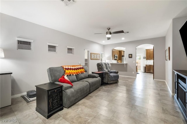 living room featuring ceiling fan