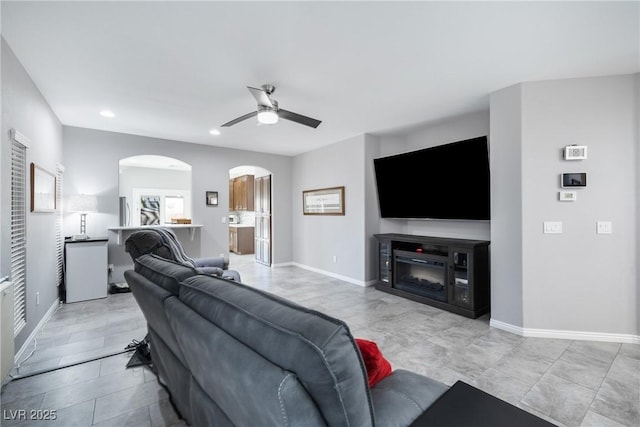 living room featuring ceiling fan