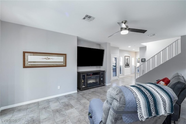 living room featuring ceiling fan