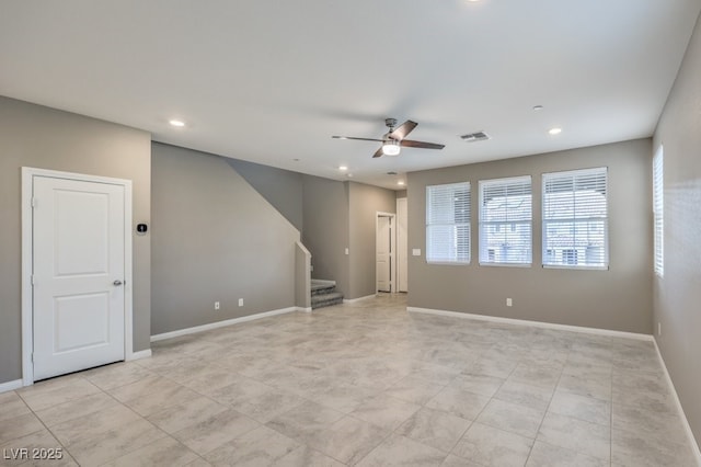 empty room with visible vents, baseboards, a ceiling fan, stairway, and recessed lighting