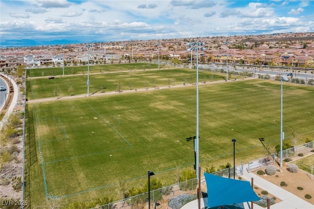 birds eye view of property with a residential view