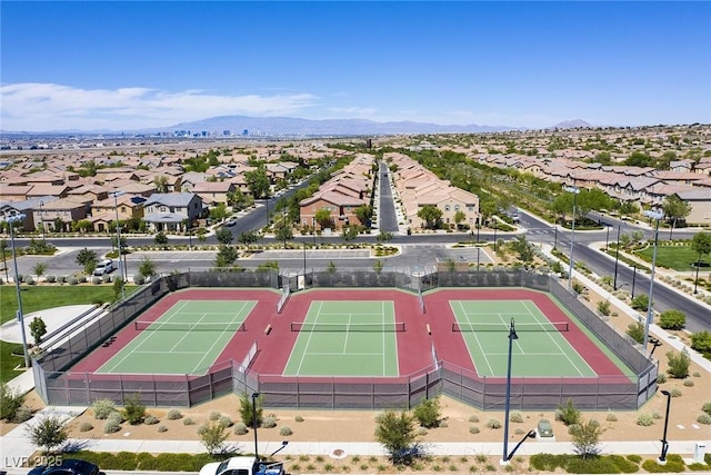 birds eye view of property featuring a residential view and a mountain view