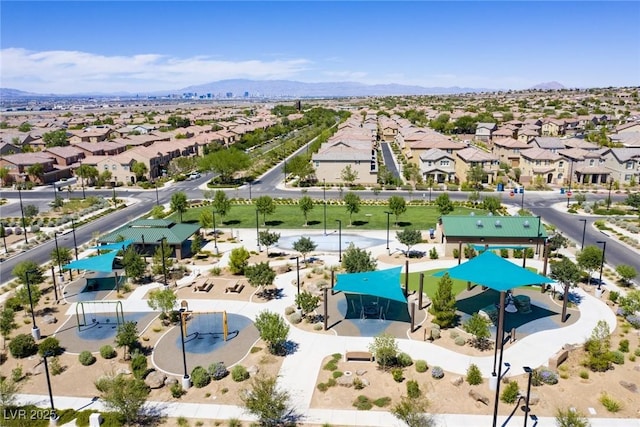 drone / aerial view with a residential view and a mountain view