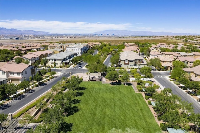 birds eye view of property with a residential view and a mountain view