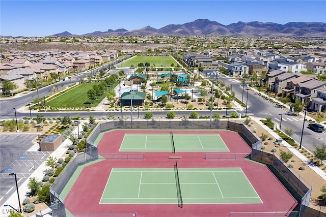 birds eye view of property featuring a mountain view