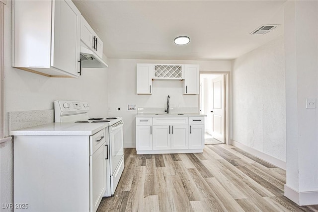 kitchen with white cabinetry, sink, white electric range oven, and light wood-type flooring