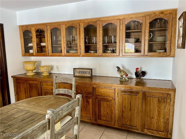 bar with light tile patterned floors