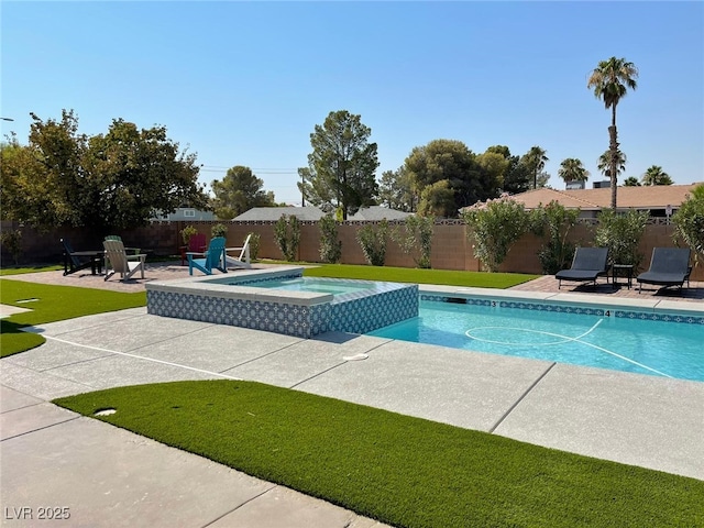 view of swimming pool with a patio, a fenced backyard, and a pool with connected hot tub