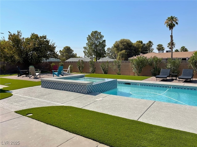 view of swimming pool with a fenced backyard, a pool with connected hot tub, and a patio