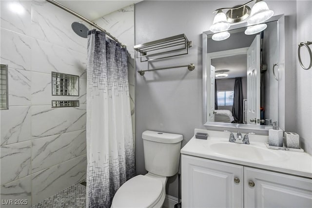 ensuite bathroom featuring ensuite bath, a tile shower, toilet, and vanity